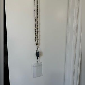 Beaded black lanyard with retractable card holder
